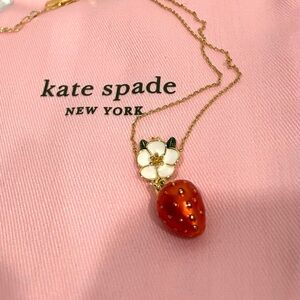 Kate Spade Red Strawberry Pendant in Gold with white Flower Necklace. New